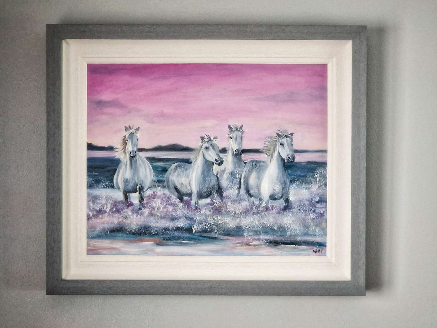 original oil painting of white wild horses running and splashing through the sea. painting by Margaret Rattigan