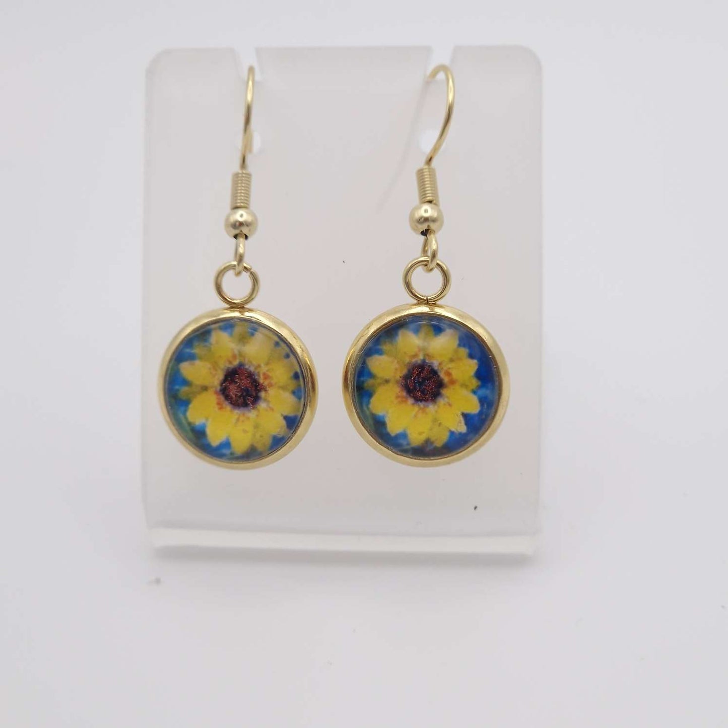 sunflower on blue dangle earring gold plated.