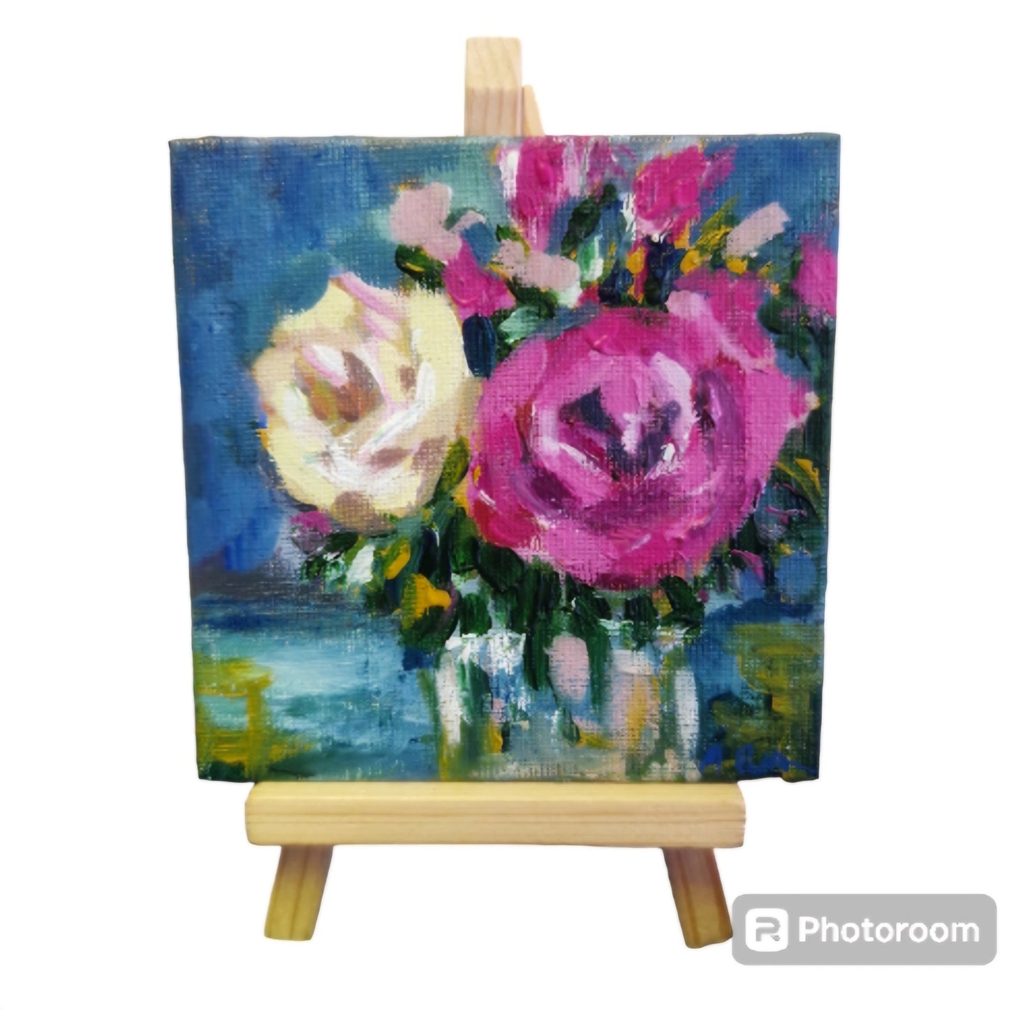 Roses in vase mini painting on easel.